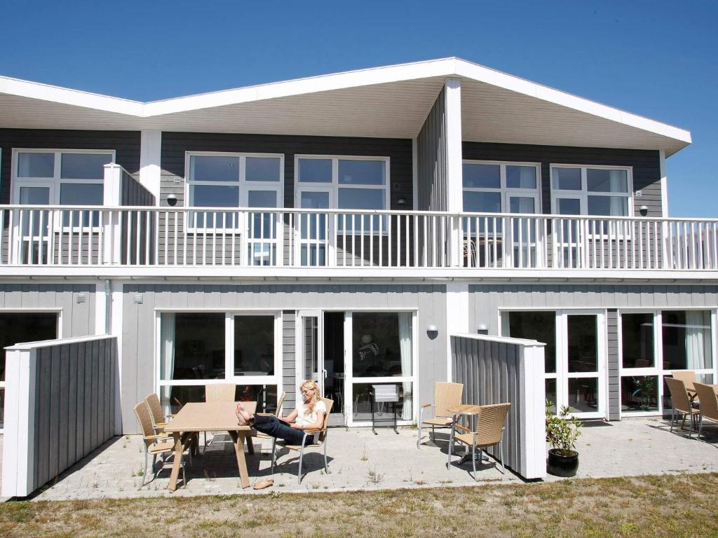 8 person holiday home on a holiday park in Løkken