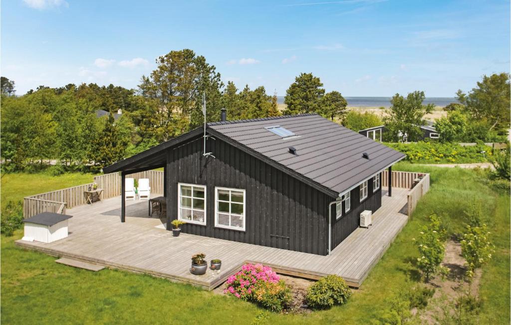 Three-Bedroom Holiday Home With A Fireplace In Frederikshavn